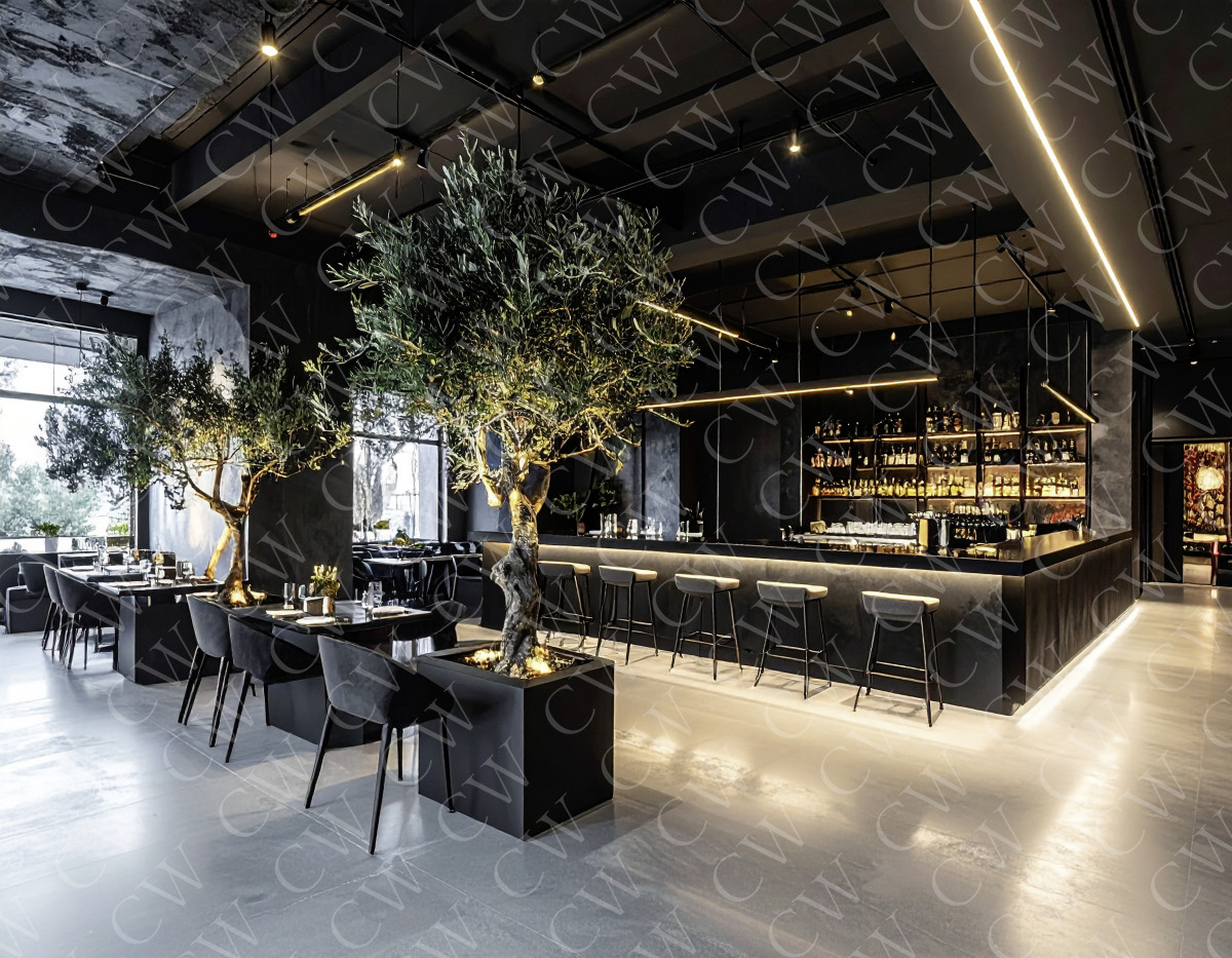 Hochwertig eingerichtetes Restaurant mit moderner Bar und großen Olivenbäumen im Innenraum.
